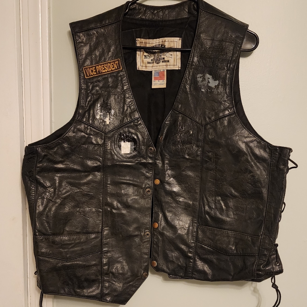 Vintage leather motorcycle vest with patches